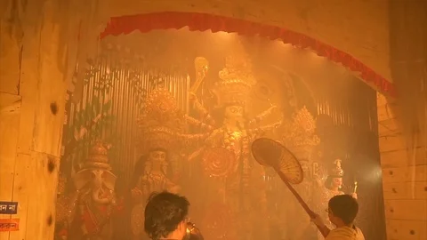 Priest worshipping Goddess Durga, Durga Puja festival celebration Stock Footage