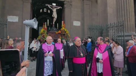 Priests and clerics getting out of the church in religion ceremony Stock Footage 241682005