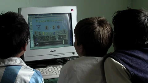 Primary School Boys Playing a Math Game on A Personal Computer in School. Stock Footage 252085967