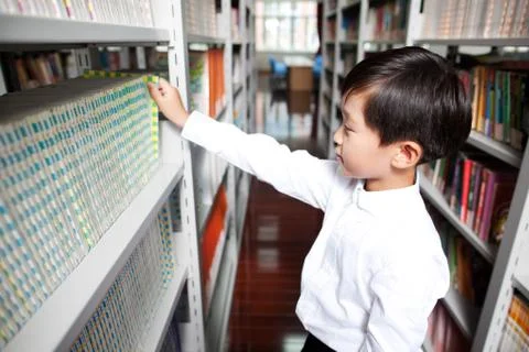 A primary school student is studying in a picture gallery Stock Photos
