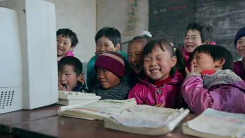 Primary school students in poor areas are taking computer courses, Hebei, China Stock Footage 143898252