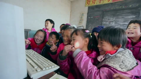 Primary school students in poor areas are taking computer courses, Hebei, China Stock-Footage 143898428
