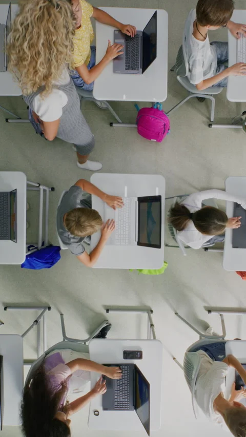 Primary School Students Practicing Digital Skills on Laptops, Creating Pictures Stock Footage 315470225
