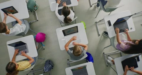 Primary School Students Practicing Digital Skills on Laptops, Creating Pictures Stock Footage 315471579
