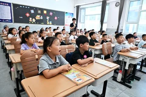 Primary school students start new campus life in Shijiazhuang Stock Photos