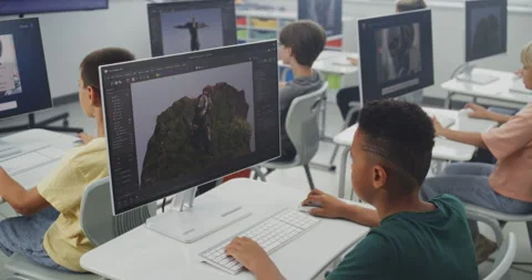Primary School Students Working on Computers, Creating 3D Objects, Studying Game Stock Footage 316290765