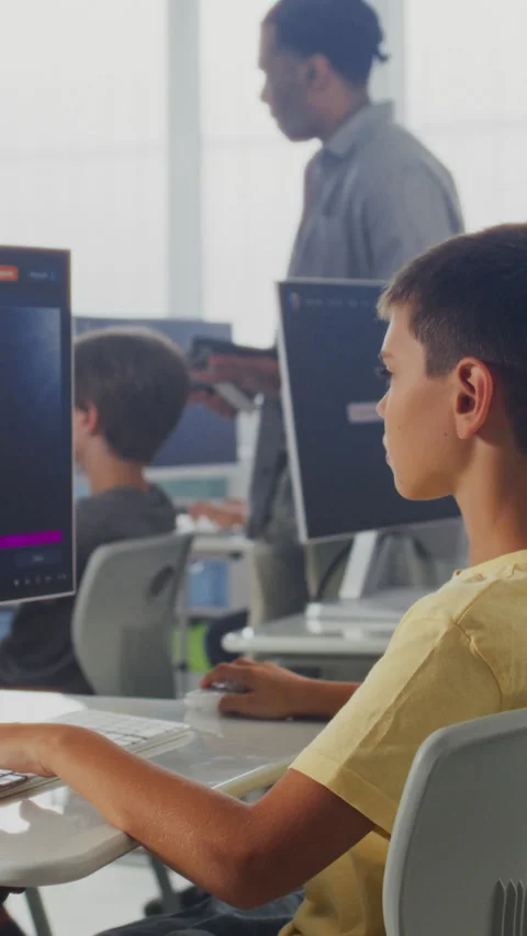 Primary School Students Working on Computers, Studying Artificial Intelligence Stock Footage 317164981