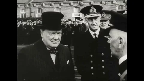 Prime Mnister Winston Churchill shake hands and walk through people Stock Footage