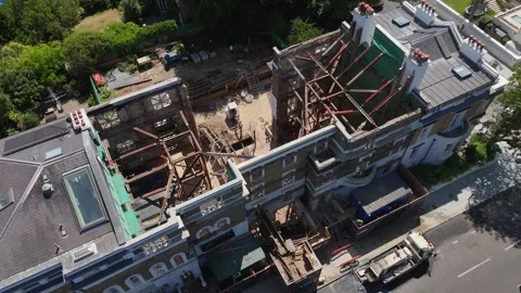Prime townhouse stripped back to its facade with steel propping and a basement Stock Footage 343475897
