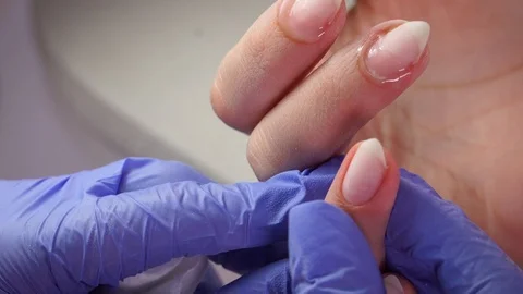 Primer application on the nail brush Stock Footage 103830813