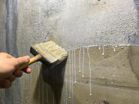 Primer process of concrete close up. Stock Photos