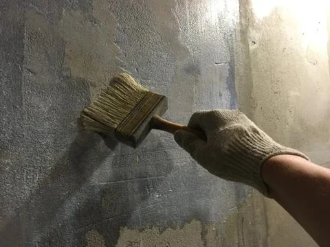 Primer process of concrete close up. Stock Photos