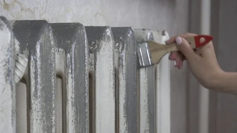 Priming heating batteries before painting Stock Footage 116129641