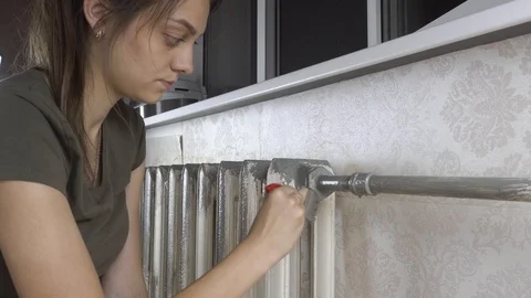 Priming heating batteries before painting Stock Footage 116129702