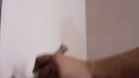 Priming on the wall Video stock 94998431