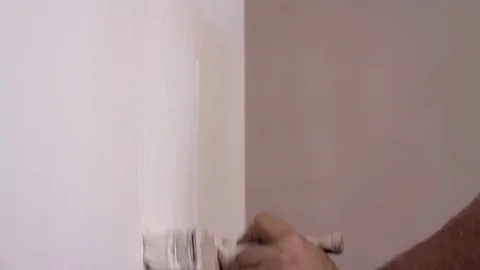 Priming on the wall Video stock 94998606