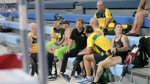 Prince Harry interacts with athletes competing in the 2017 Invictus Games - 2017 Stock Footage 86380844