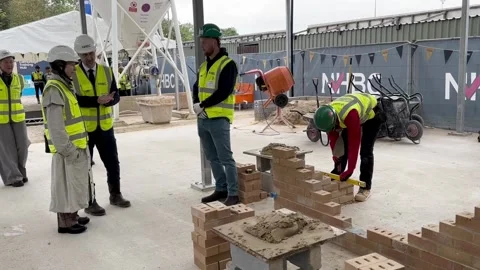 Princess Royal meets apprentice bricklayers on visit to open new training hub Video stock 273723190