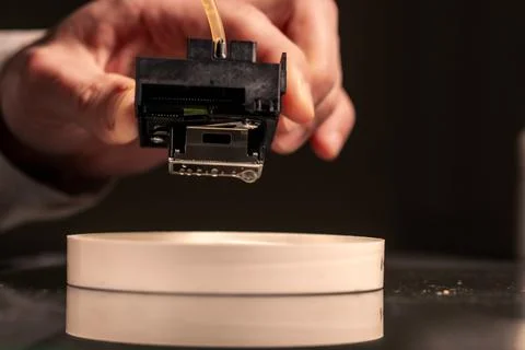 Print head restoration process bringing damaged printer component back to l.. Stock Photos