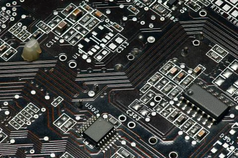 Printed circuit board and microchip, or cpu closeup - electronic component fo Stock Photos