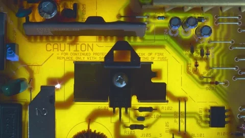 A printed circuit board with capacitors, coil, transistor with a radiator Stock Footage 268887053