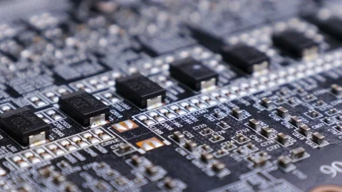 Printed Circuit Board, Graphics Card Components: RAM Chips, GPU Die. Macro Shot Stock Footage 195156973