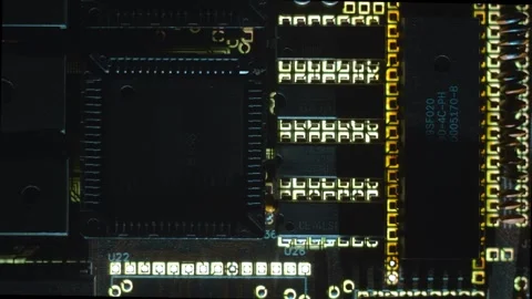 A printed circuit board with many microchips and other radio components Stock Footage 268895973
