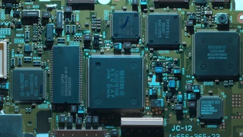 A printed circuit board with microchips and other radio components  Stock Footage 268884653