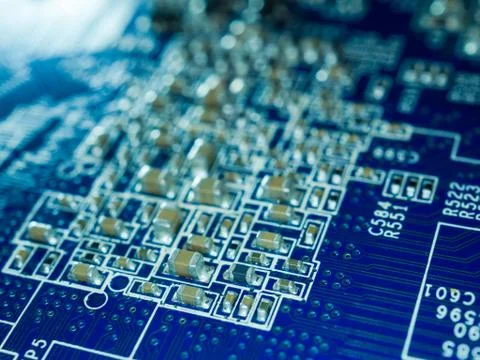 Printed circuit board with microchips and other electronic components Stock Photos
