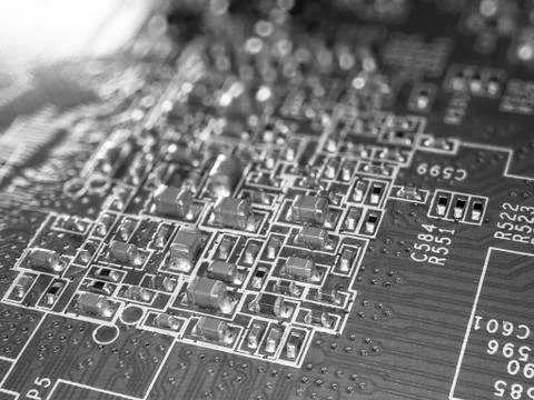Printed circuit board with microchips and other electronic components Stock Photos