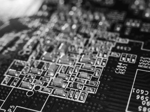 Printed circuit board with microchips and other electronic components Stock Photos