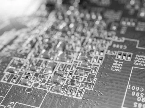 Printed circuit board with microchips and other electronic components Stock Photos