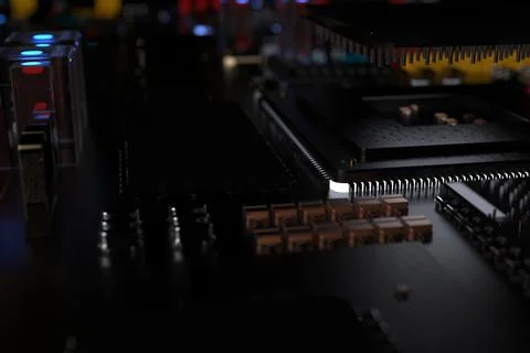 Printed circuit board with microchips, processors and other computer parts on Stock Photos