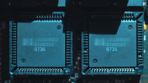 A printed circuit board with microchips for which shadows fall from the light Stock Footage 268955334