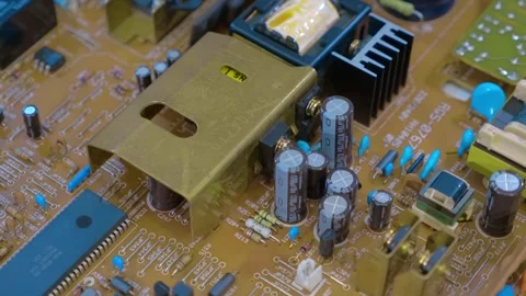 Printed circuit board with a microcircuit, capacitors, transformers Stock Footage 268914558