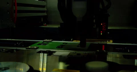 A printed circuit board moving on a conveyor belt Stock Footage 336556616