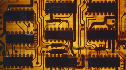 A printed circuit board with rows of microchips and other radio components Stock Footage 268891042