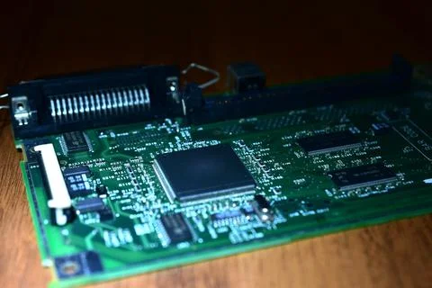 The printed circuit board is on the table. Stock Photos