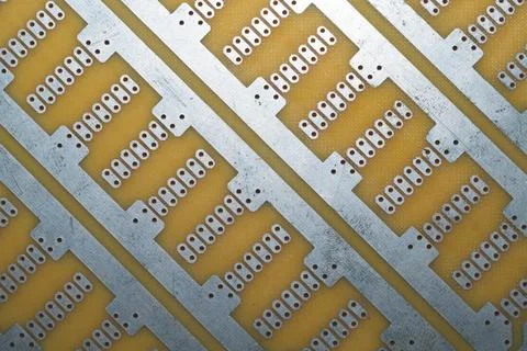 Printed circuit board without elements. perforated textolite surface. templat Stock Photos