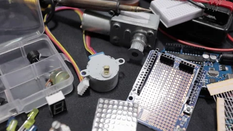 Printed circuit boards, microcircuits and engineering equipment on the table Stock Footage 136695936