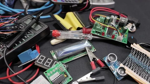Printed circuit boards, microcircuits and engineering equipment on the table Stock Footage 136696684