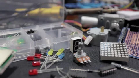 Printed circuit boards, microcircuits and engineering equipment on the table Stock Footage 136697758