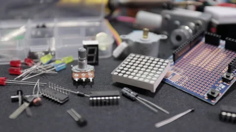 Printed circuit boards, microcircuits and engineering equipment on the table Stock Footage 136697849