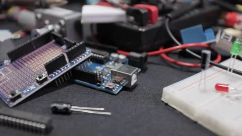 Printed circuit boards, microcircuits and engineering equipment on the table Stock Footage 136697917