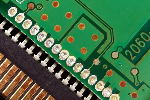 Printed green computer circuit board macrophoto Stock Photos