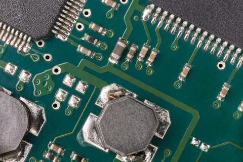 Printed green computer circuit board macrophoto Stock Photos