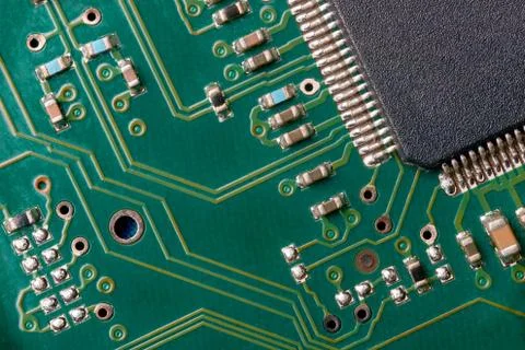 Printed green computer circuit board macrophoto Stock Photos
