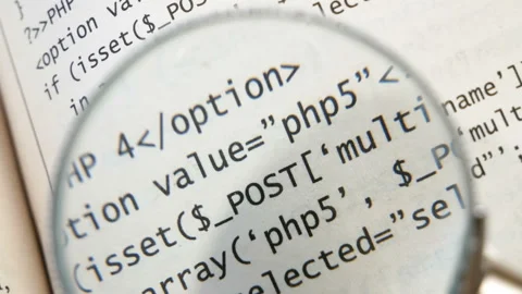 Printed Internet php Code with magnifier Stock Footage 155804130