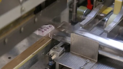 Printed material is packed in foil Stock Footage 75227372