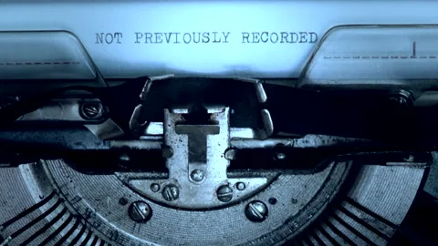 Printed page being pulled out typewriter. Old film Stock Footage 168324632